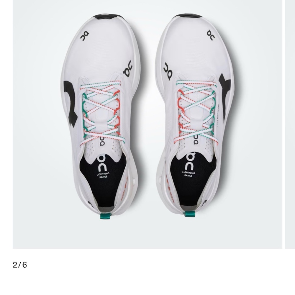 On Running White and Black Athletic Shoes